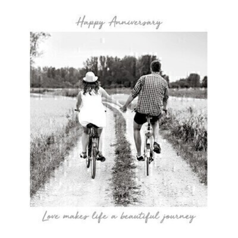 This Anniversary greetings card called Happy Anniversary Bikes features a couple riding bikes down a lane and holding hands with the inspirational message Love Makes Life a Beautiful Journey written on the front.  This card is perfect to send to someone celebrating an Anniversary and has been left blank inside so you can write your own message. It comes complete with a red envelope and is a lovely card from the Art Group.